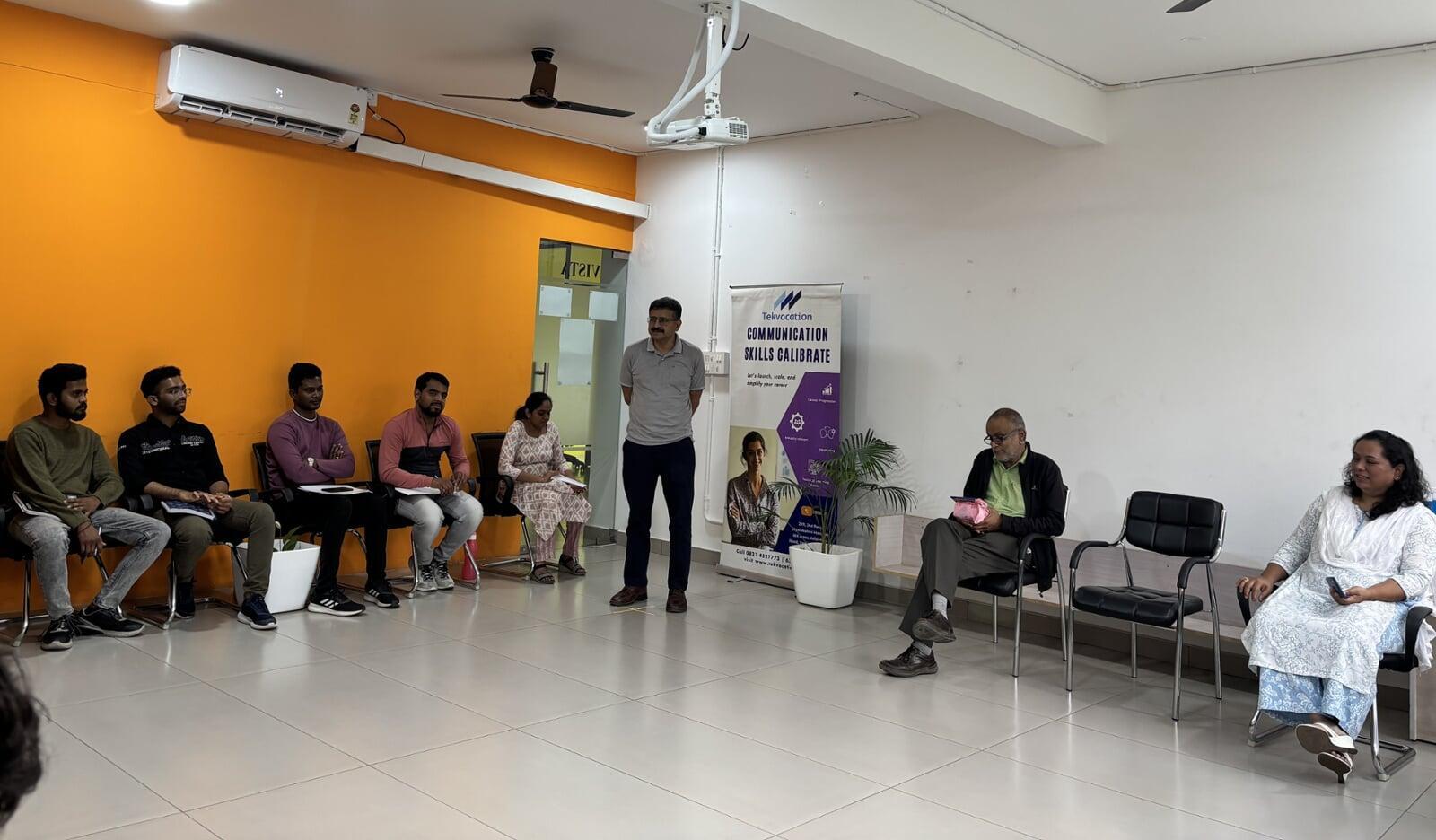 Reflection event at Tekvocation with Tony G Thomas addressing interns after their 3-month experiential learning program