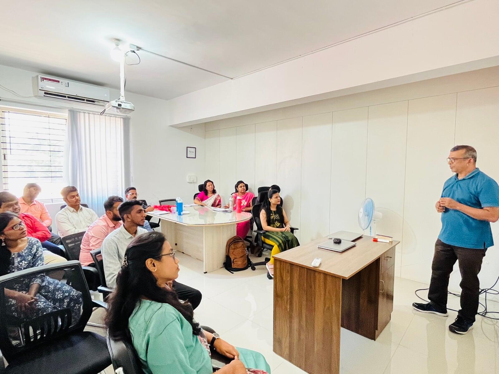 Tekvocation employees participating in the Communication Calibrate program focused on workplace communication and professional etiquette